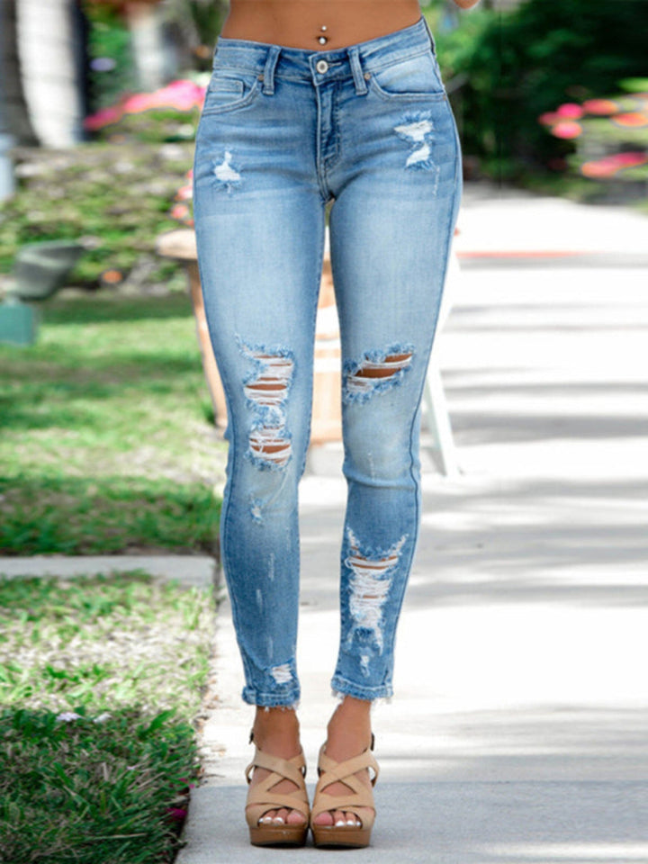 Slim - Fitting Ripped Jeans - Trendy Bottoms/Jeans in Light Denim for Women | The802Gypsy