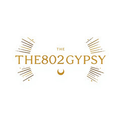 The802Gypsy logo featuring elegant, minimalist typography in a light golden or neutral tone, centered on a clean background.