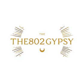 The802Gypsy logo featuring elegant, minimalist typography in a light golden or neutral tone, centered on a clean background.