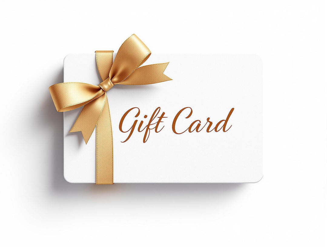 Gold bow wrapped around a white gift card for The802Gypsy.