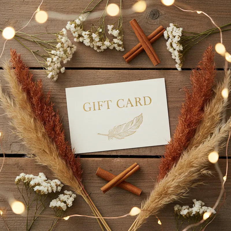 Gift card with decorative elements on a wooden surface.