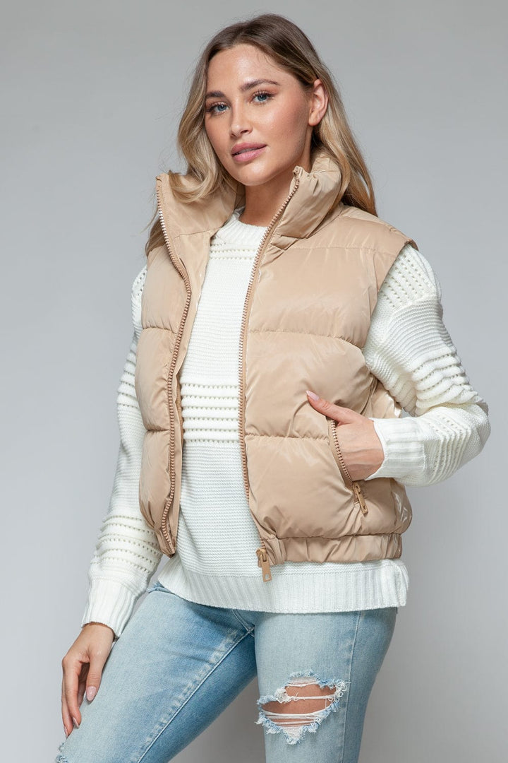 TAN outerwear/vests with S