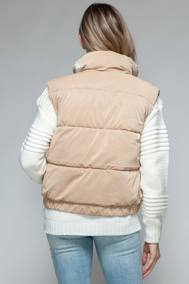 TAN outerwear/vests with S