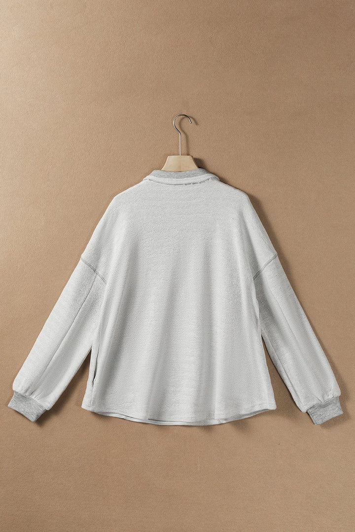 The802Gypsy  Tops White Textured Side Pockets Buttoned Neckline Sweatshirt